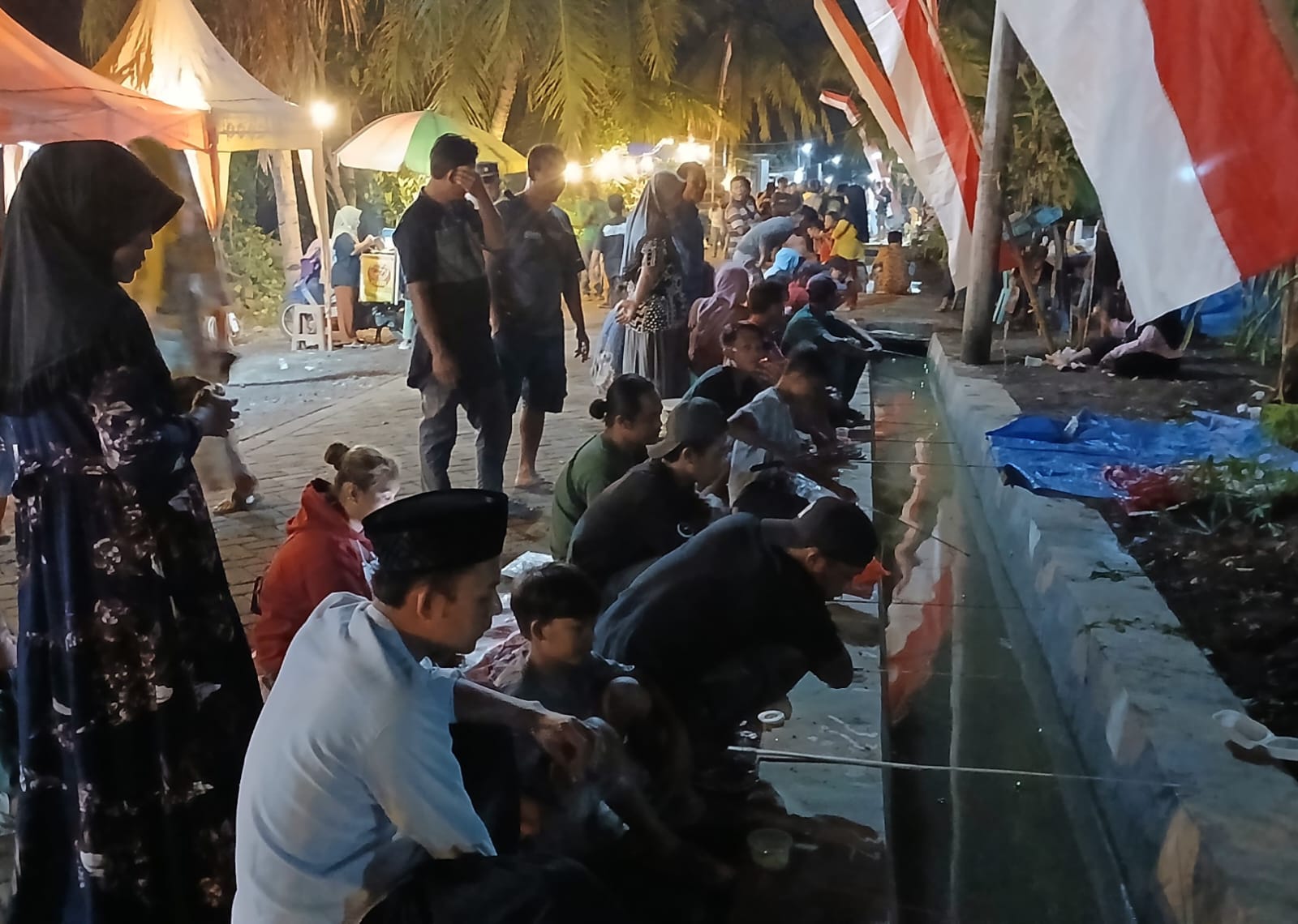 Warga-Kedungrejo-Lincip-Gelar-Tasyakuran-Proyek-Irigasi-dengan-Tumpengan-Dan-Lomba-Mancing